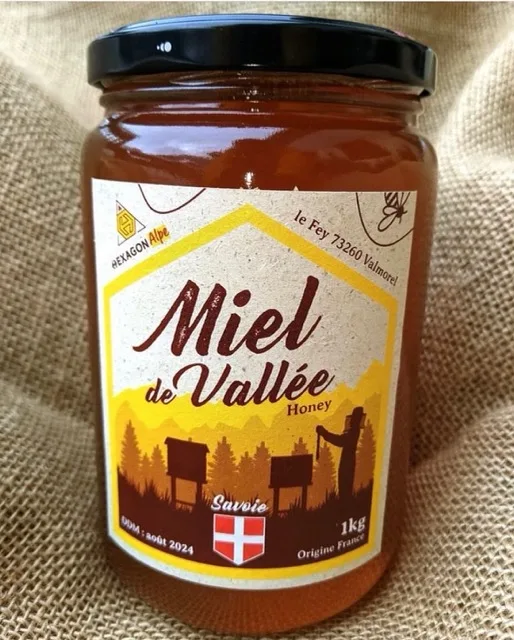 photo d'un pot de miel hexagonalp